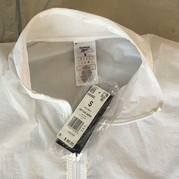 REEBOK NWT UNISEX LESMILLS TRACK  PERFORMANCE JACKET COAT ZIP UP WINDBREAKER SM - Picture 4 of 12